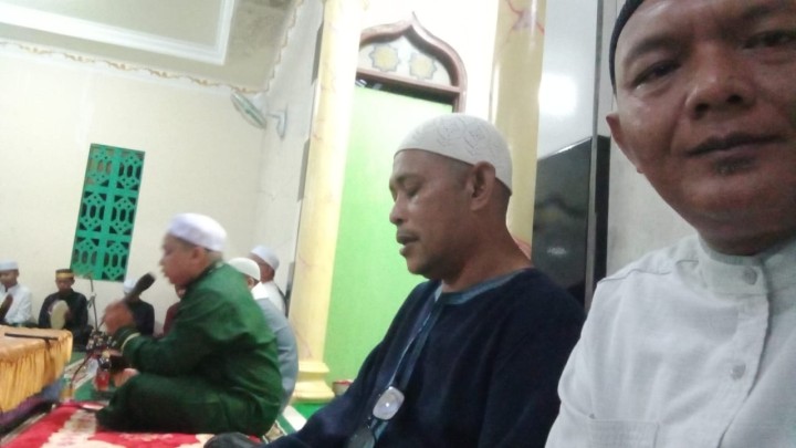 Menghadiri Isra Miraj di langgar Al-Mubaraq Kelurahan Bantuas