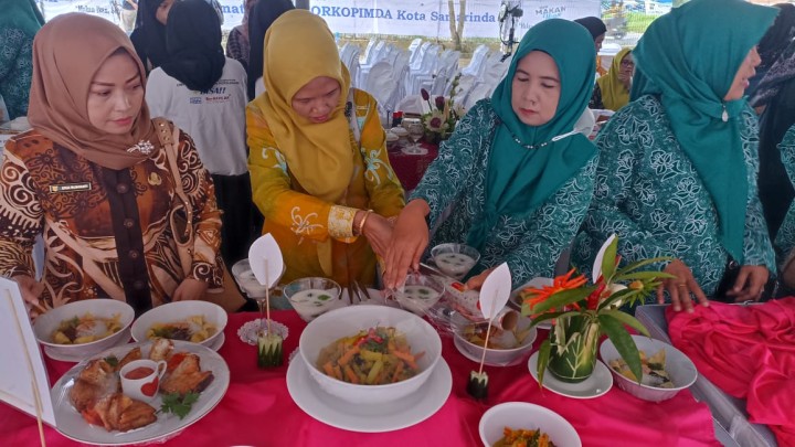 Kegiatan Monitoring dan Evaluasi Pemberian makanan Tambahan ( PMT) di Kelurahan Pasar pagi,
