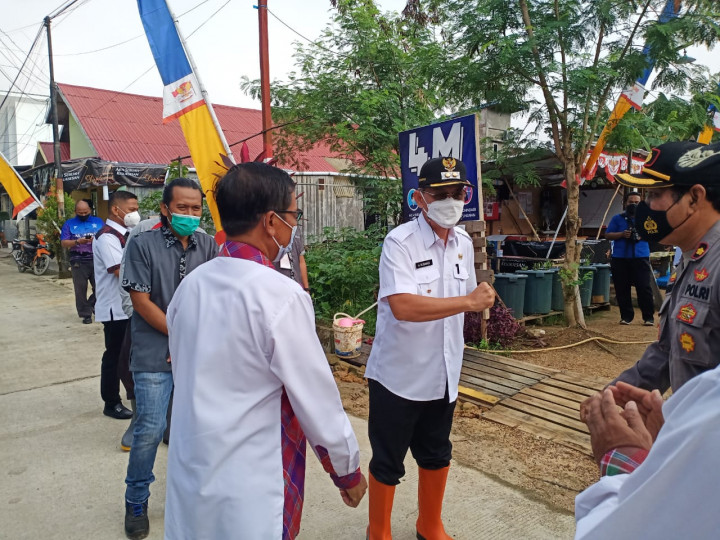 Samarinda, 07 April 2021 Menghadiri penanaman bibit pohon pepaya dan ikan lele di kampung tangguh Loa Bakung