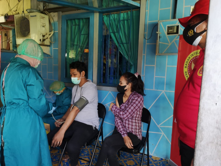 Pemberian Vaksinasi Tahap Kedua Oleh BIN Kaltim di Wilayah Karang Anyar, Minggu 15 Agustus 2021.
