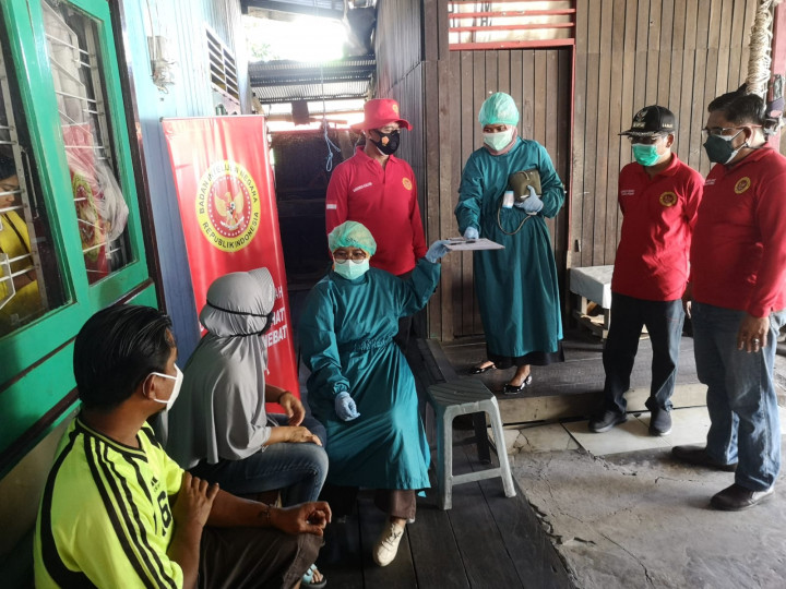 Pemberian Vaksinasi Tahap Kedua Oleh BIN Kaltim di Wilayah Karang Anyar, Minggu 15 Agustus 2021.
