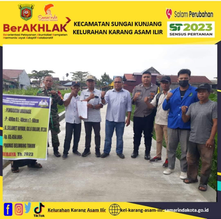 serah terima pembuatan draenase sepanjang 400 meter di RT. 30