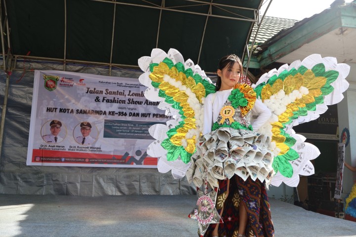 JALAN SANTAI DAN PERLOMBAAN DI KELURAHAN LOA BUAH UNTUK MERAYAKAN ULANG TAHUN KOTA SAMARINDA KE-356 TAHUN