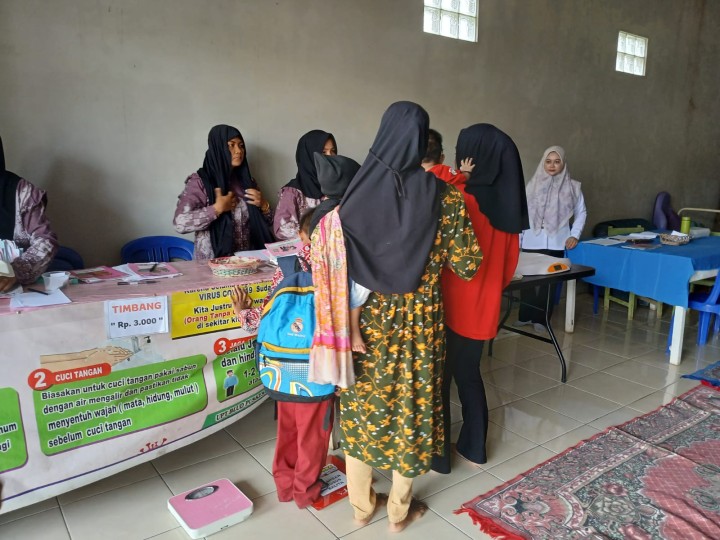 Kunjungan ke posyandu lubuk sawa