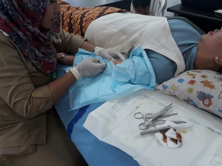 Pelayanan KB Gratis Dalam Rangka Hari Kesatuan Gerak PKK di Kantor Kelurahan Sidomulyo