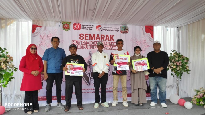 Mengikuti kegiatan Lomba Karaoke Tingkat Kelurahan