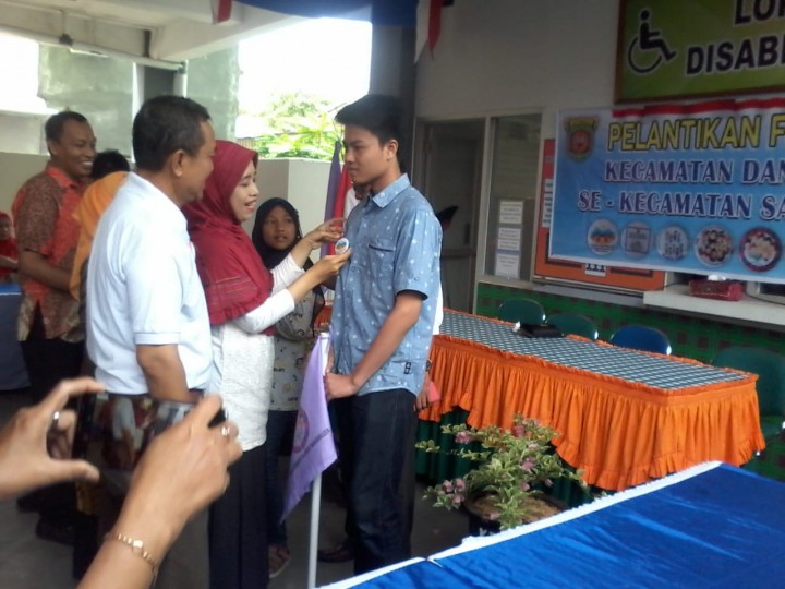 mengikuti kegiatan pelantikan Forum Layak Anak Kecamatan Samarinda Kota