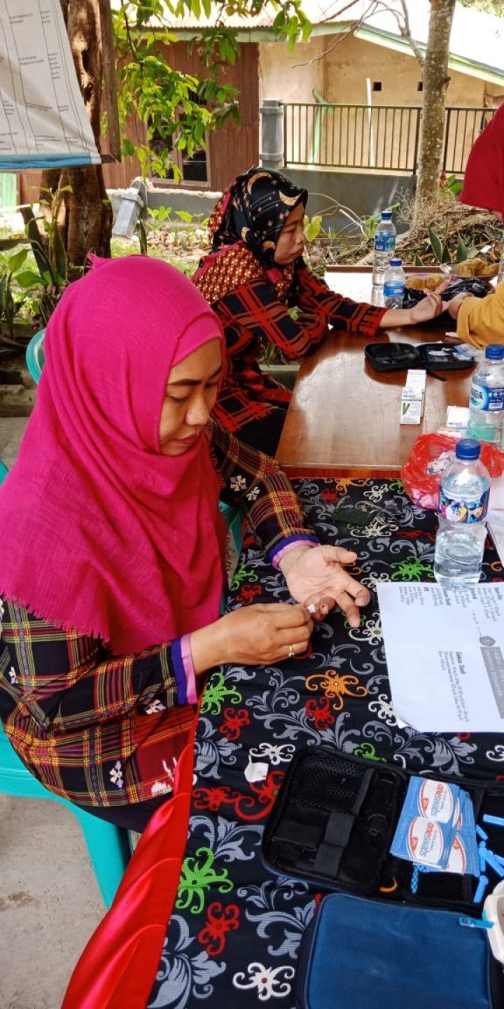 Kegiatan Pemeriksaan Kesehatan Gratis Oleh KKN Unmul Tahun 2018 Di Kelurahan Tanah Merah