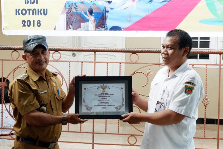 Penyerahan Bantuan BDI Oleh KOTAKU kepada warga Temindung Permai Perwakilan RT.012,RT.025 pada Selasa, 15 Januari 2019 Pukul 09.00 WITA