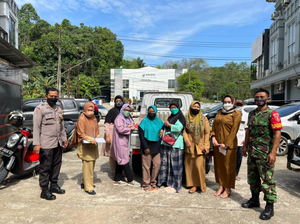 Pendistribusian Minyak Goreng Curah Melalui RT