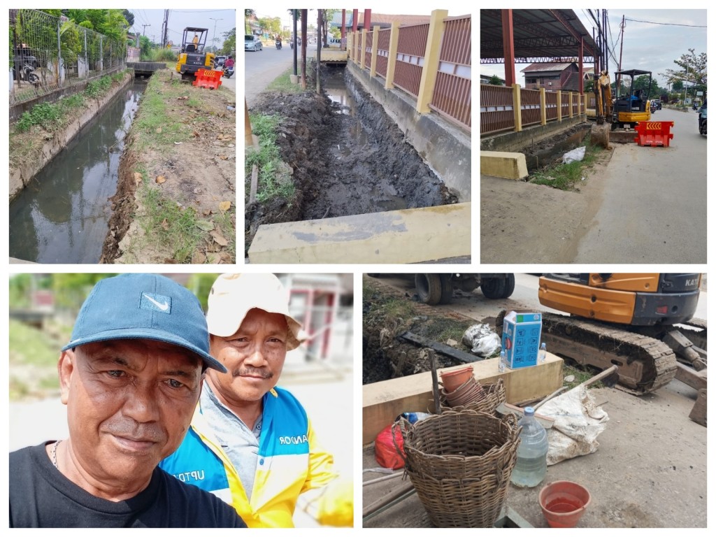Pengangkutan sedimentasi dari parit oleh Tim PUPR Kota Samarinda di Jl. Rapak Indah RT. 35