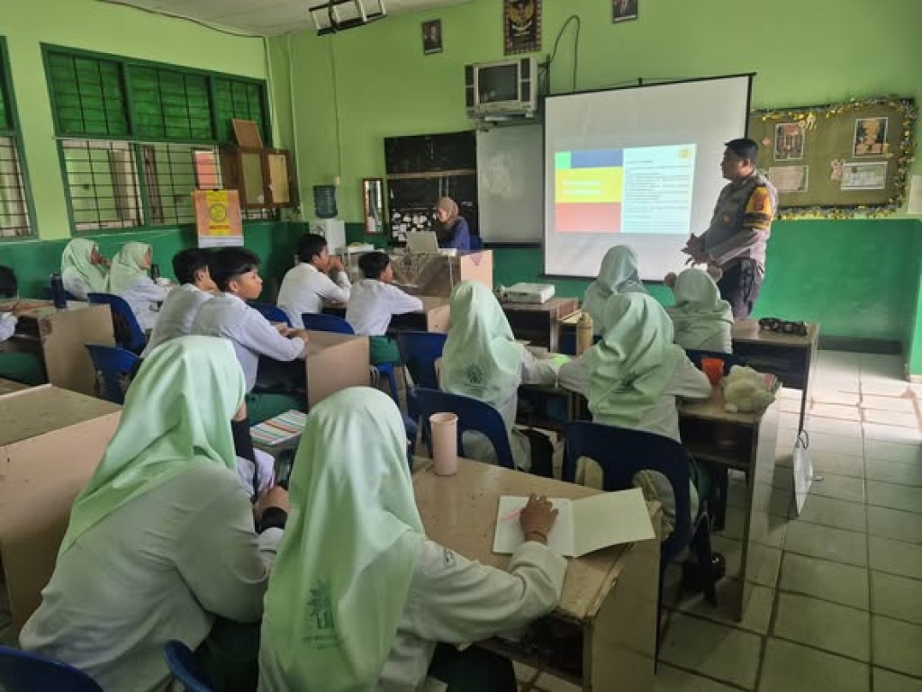 Kegiatan memberikan edukasi tentang Wawasan Kebangsaan bertempat di SMP Muhammdiyah 2 Samarinda