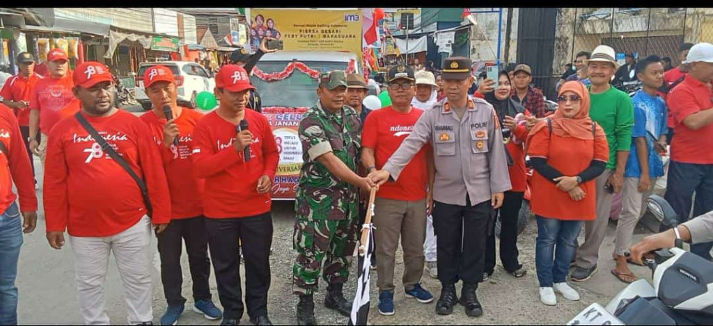 Membuka Kegiatan Pawai Pembangunan Kelurahan Simpang Tiga Kecamatan Loa Janan Ilir