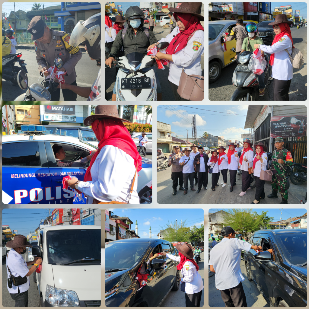 PEMBAGIAN BENDERA MERAH PUTIH PADA WARGA MASYARAKAT DI WILAYAH KELURAHAN PASAR PAGI
