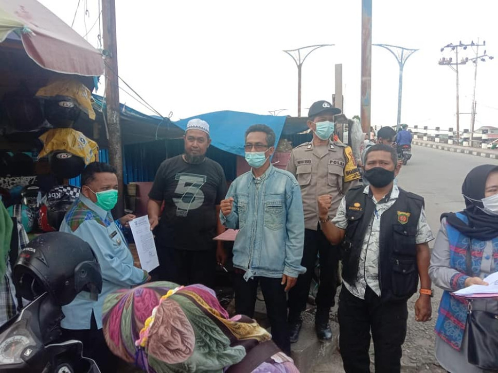 KEGIATAN MEMBERIKAN HIMBAUAN / TEGURAN KEPADA PKL DAN JURU PARKIR DI JL. PERNIAGAAN