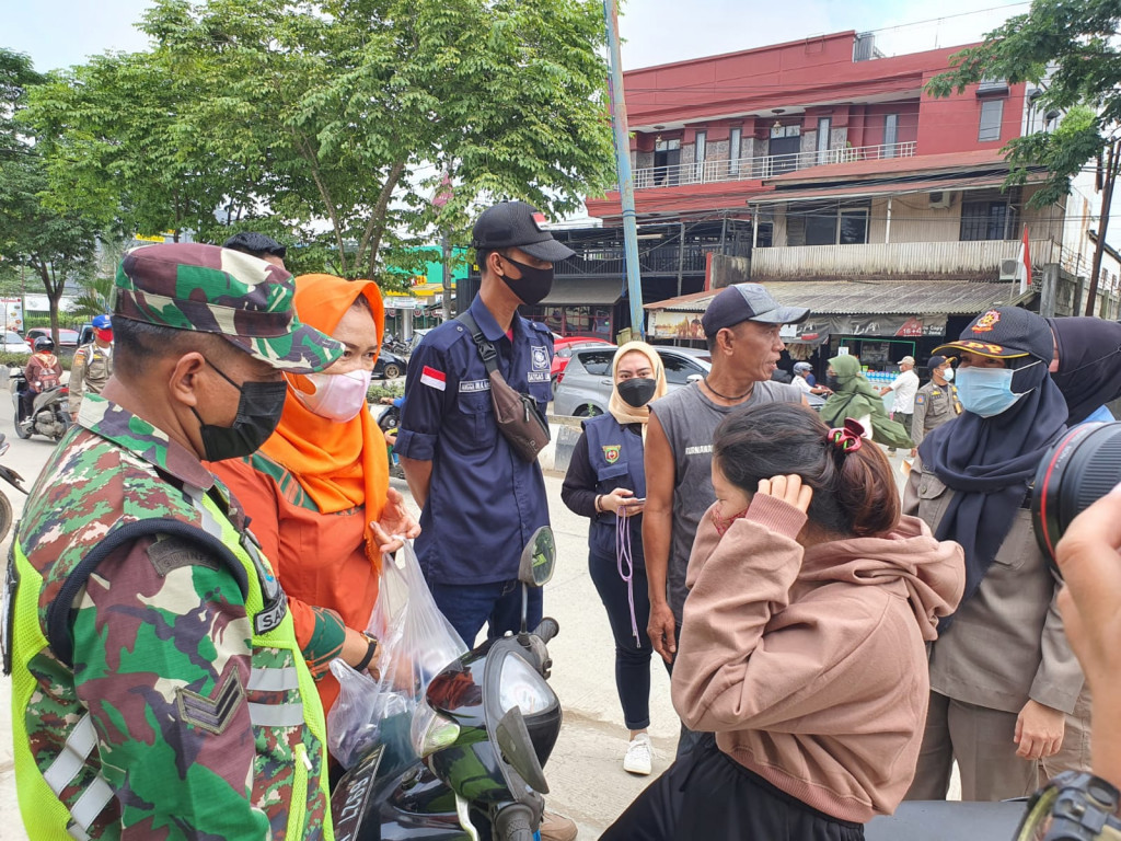 Sosialisasi Protokol Kesehatan dan Yustisi Masker di Jalan D.I Panjaitan