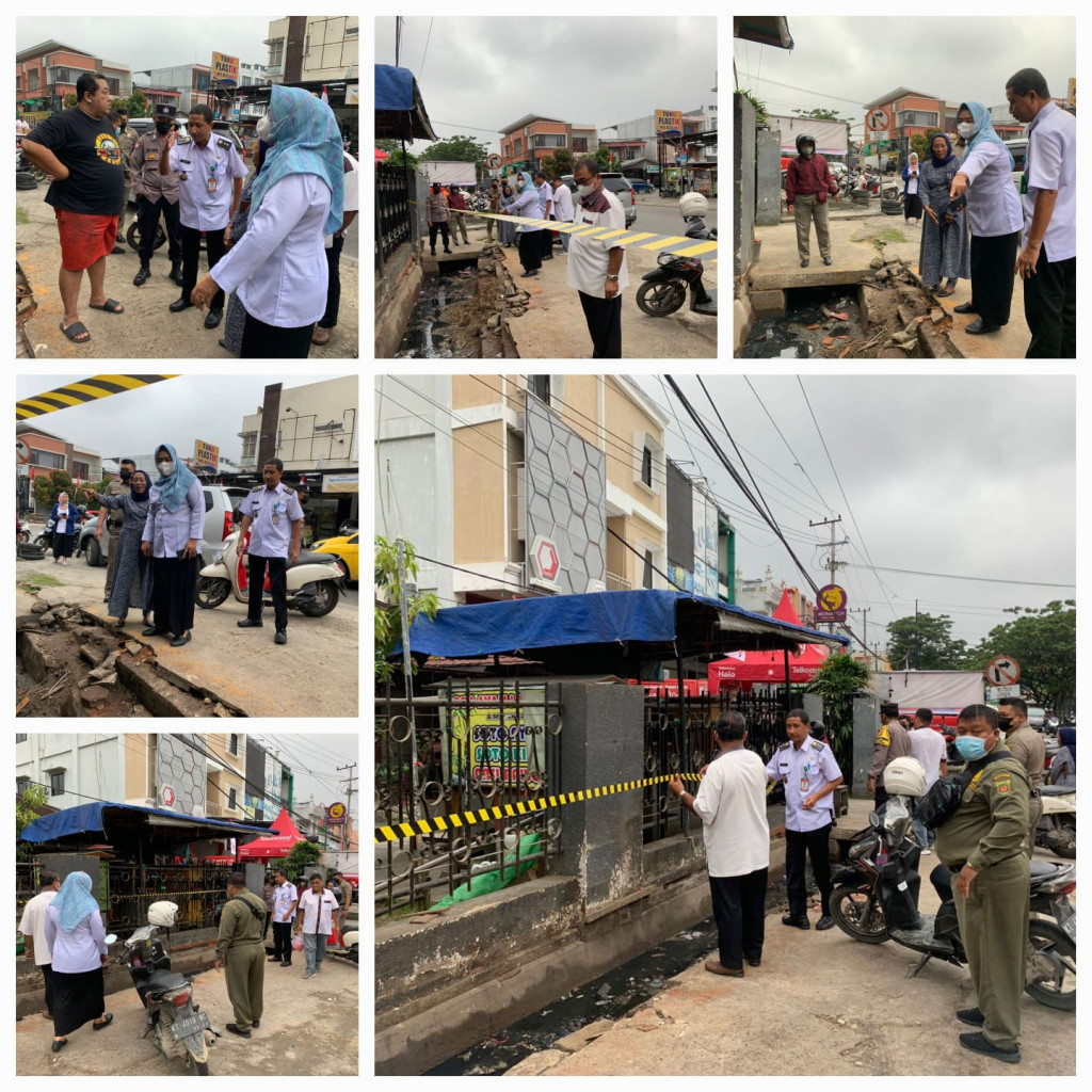 Pemasangan Police Line di Jalan AM. Sangaji Kelurahan Bandara