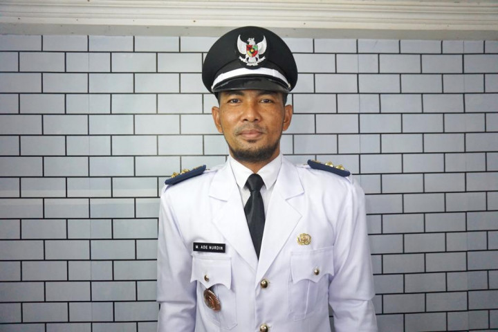 M. ADE NURDIN, S. Hut